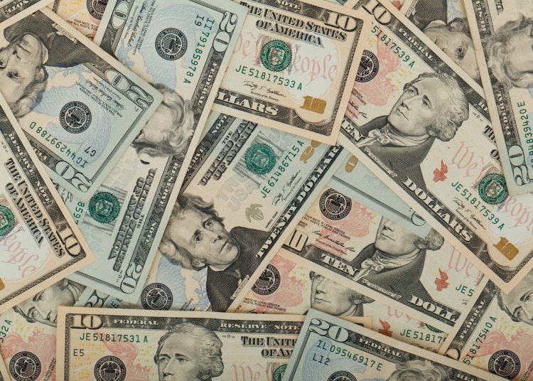 Former President Trump calls Bitcoin a scam, competing with the Dollar