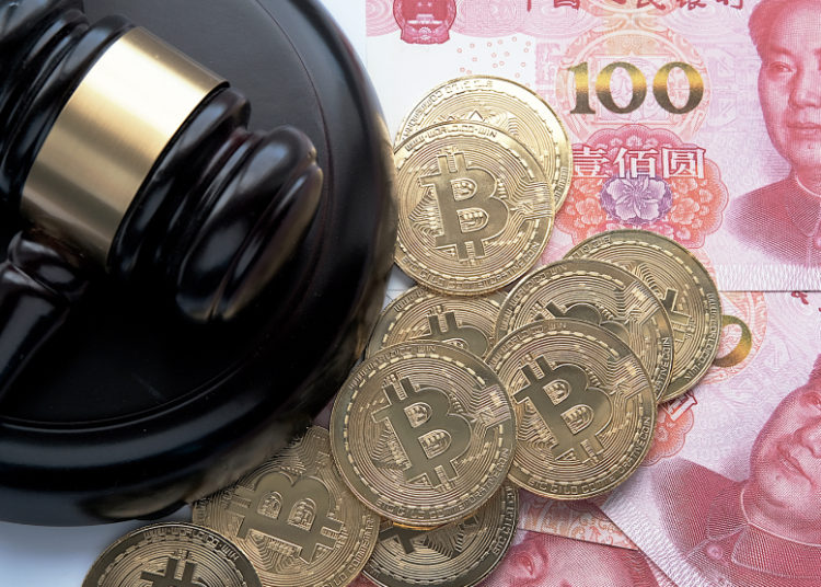 Chinese central bank official says Bitcoin and stablecoins threaten financial security