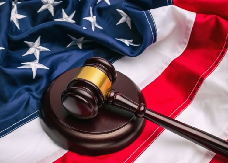 Coinbase CLO Argues Former SEC Crypto Stance Shares Similarities With US Tariffs Case